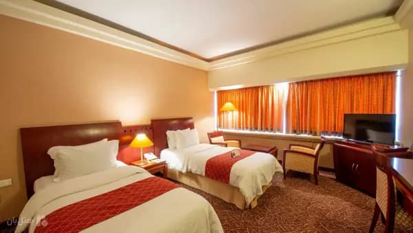 تصویر اتاق دوتخته تویین هتل هما شیراز اتاق دوتخته تویین در هتل هما شیراز